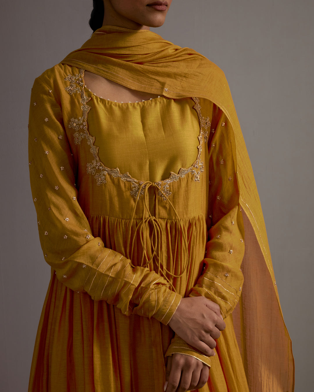 mustard yellow hand embroidered gather anarkali set