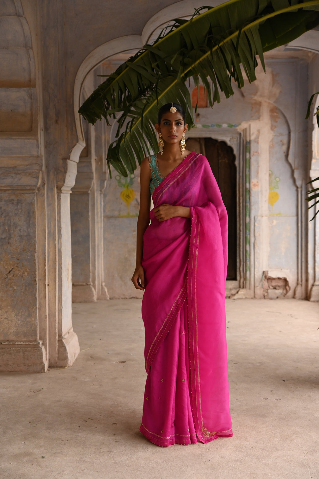 fuchsia pink organza saree with blouse