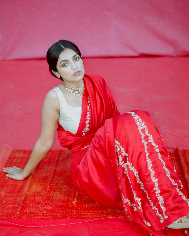 red hand embroidered saree and blouse