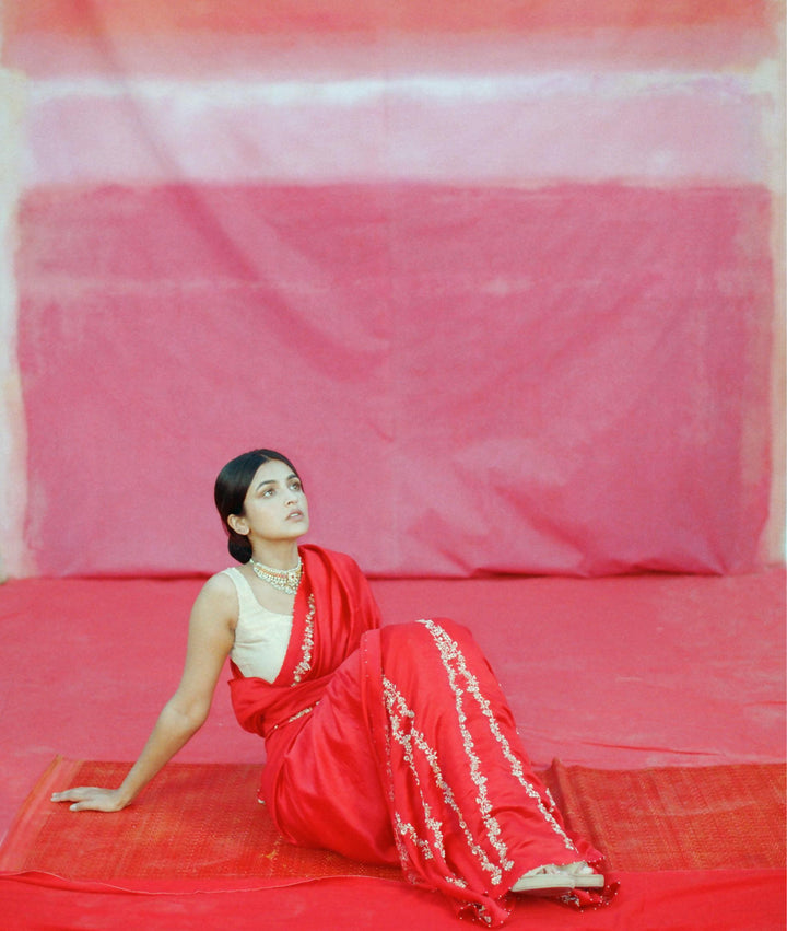 red hand embroidered saree and blouse