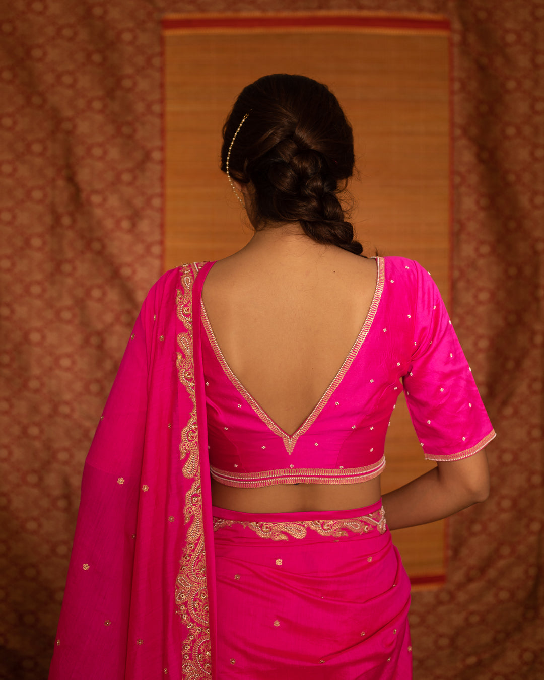 fuchsia hand embroidered silk saree with v neck blouse