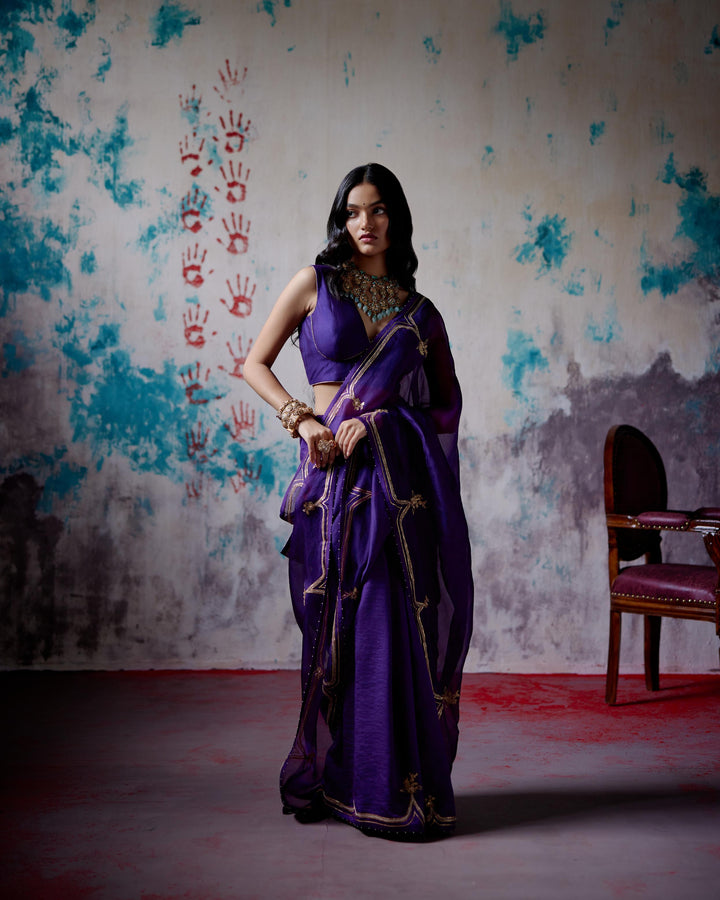 purple half and half saree with blouse