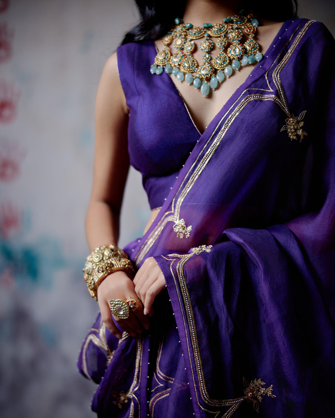 purple half and half saree with blouse