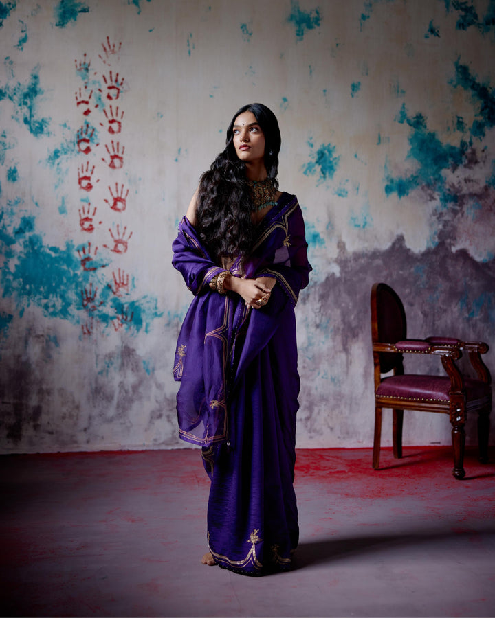 purple half and half saree with blouse