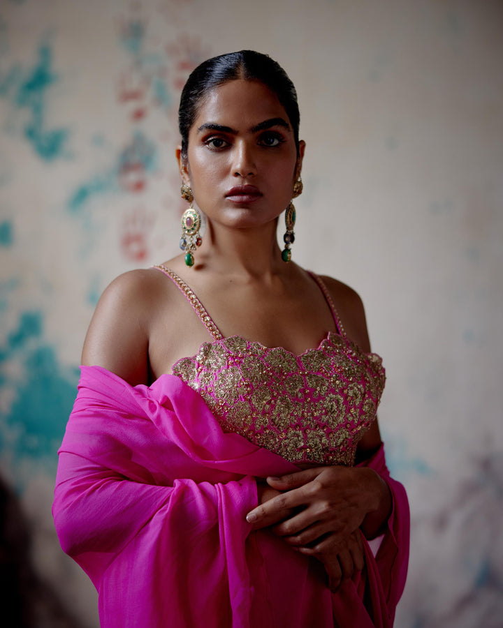 fuchsia pink drape saree with bralet blouse