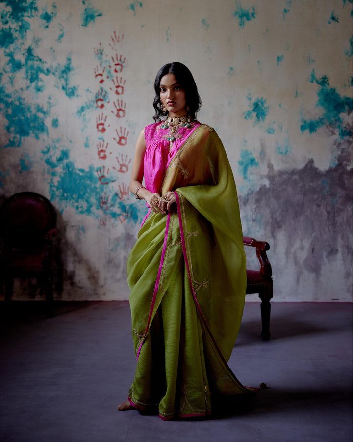 olive half and half saree with long blouse