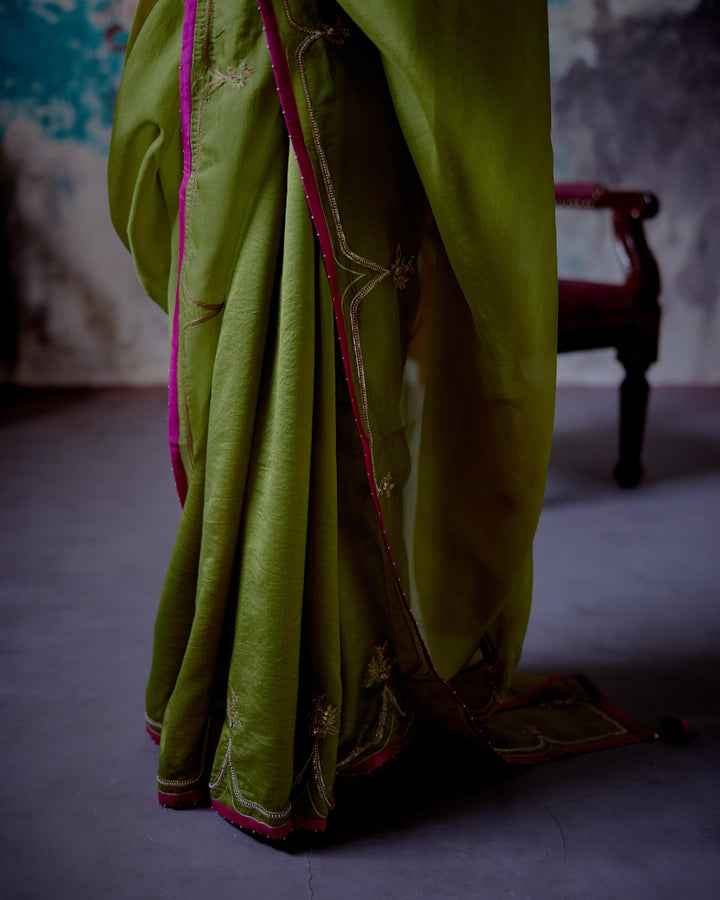 olive half and half saree with long blouse