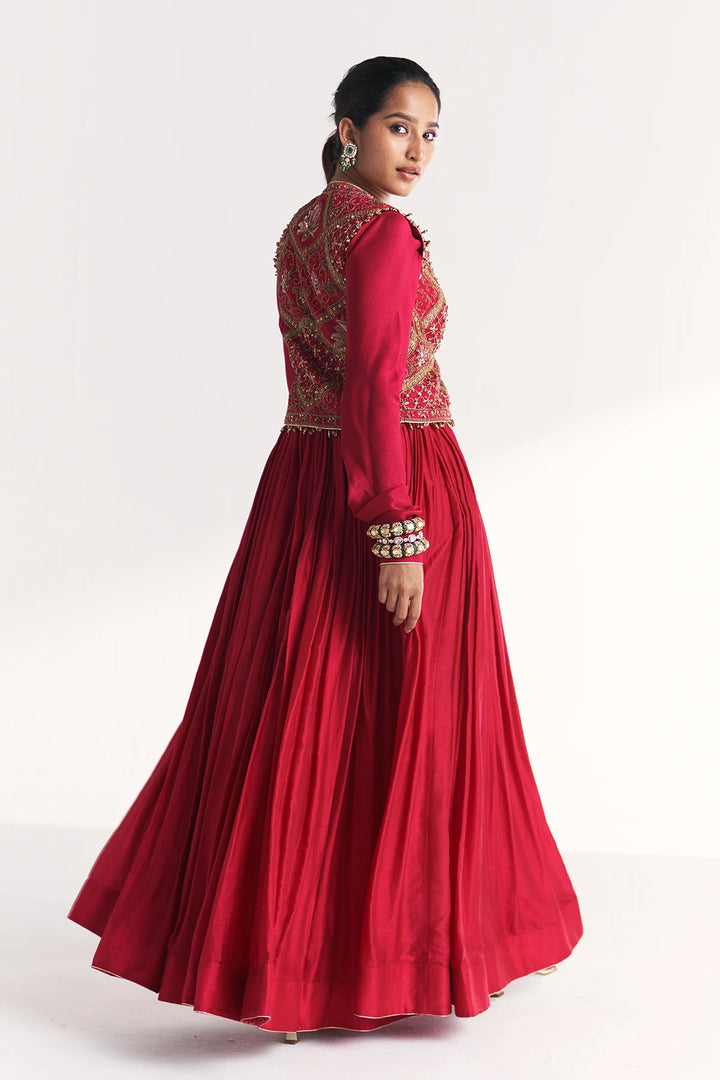 Red traditional Anarkali with gold embroidery on a white background