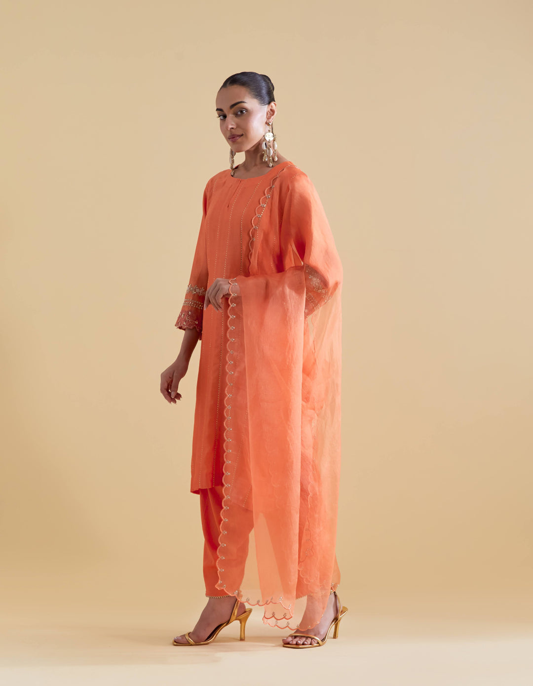 Orange Short Kurta with a Salwaar