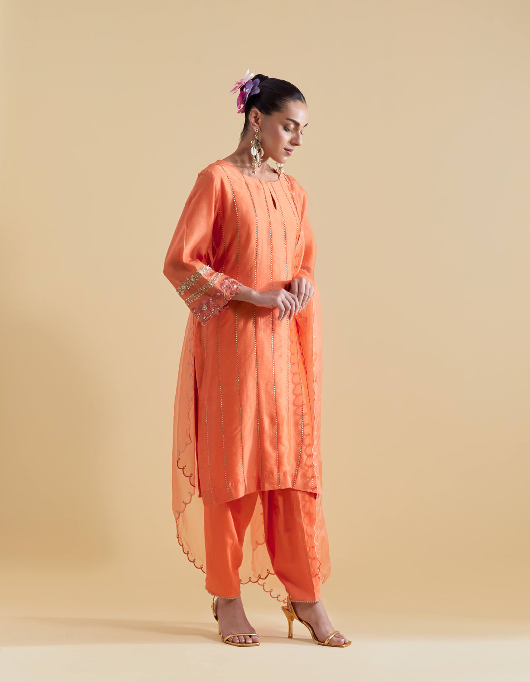 Orange Short Kurta with a Salwaar