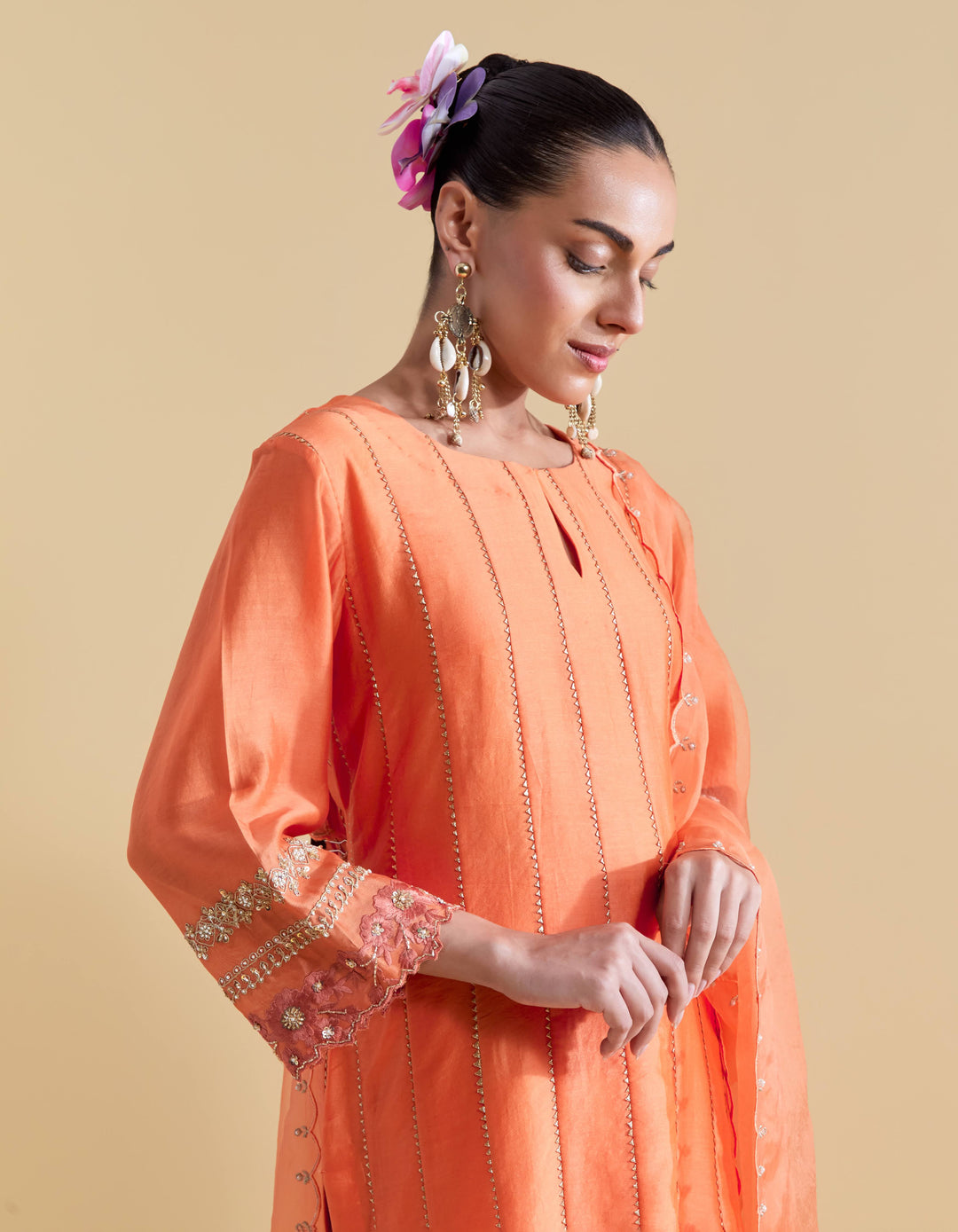 Orange Short Kurta with a Salwaar