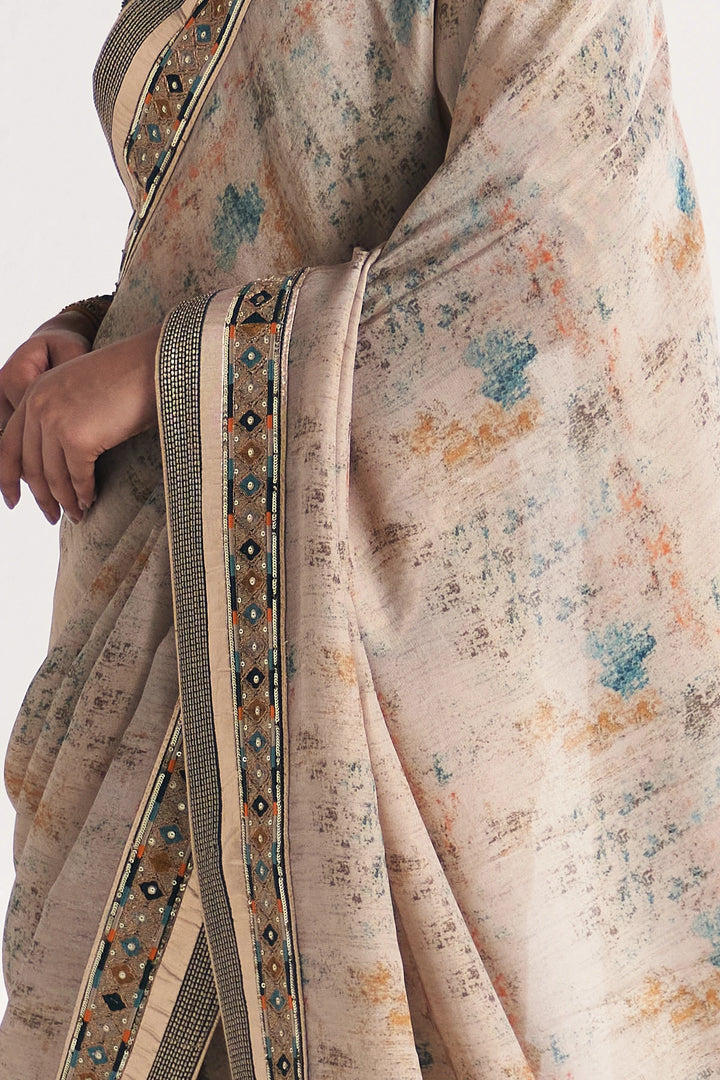 Close-up of a floral saree with intricate border details