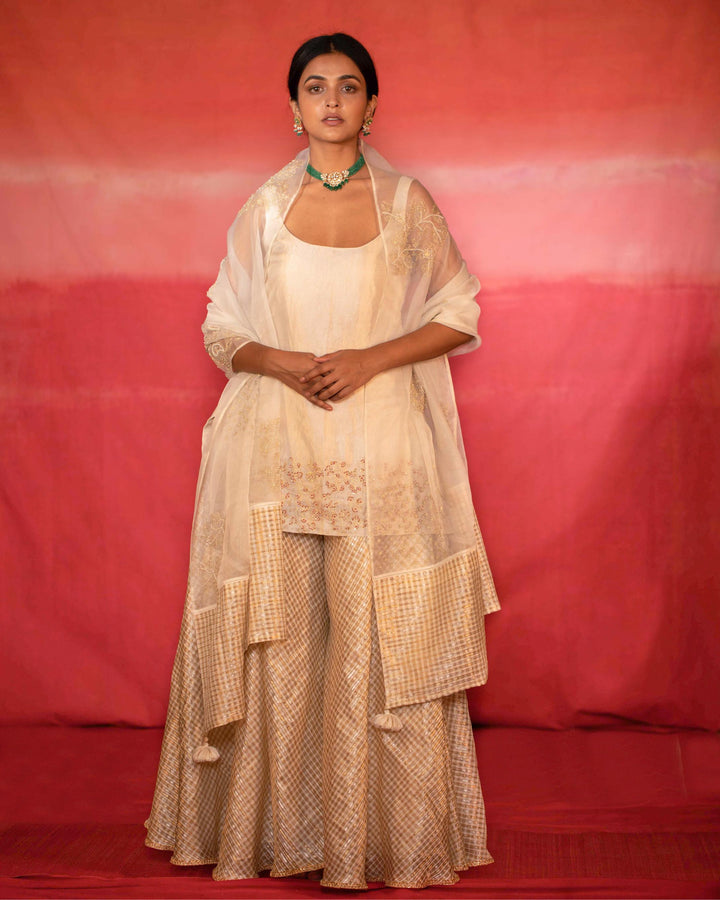 metallic jaal hand embroidered short kurta and sharara set