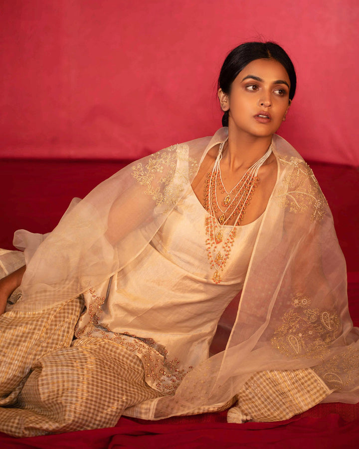 metallic jaal hand embroidered short kurta and sharara set
