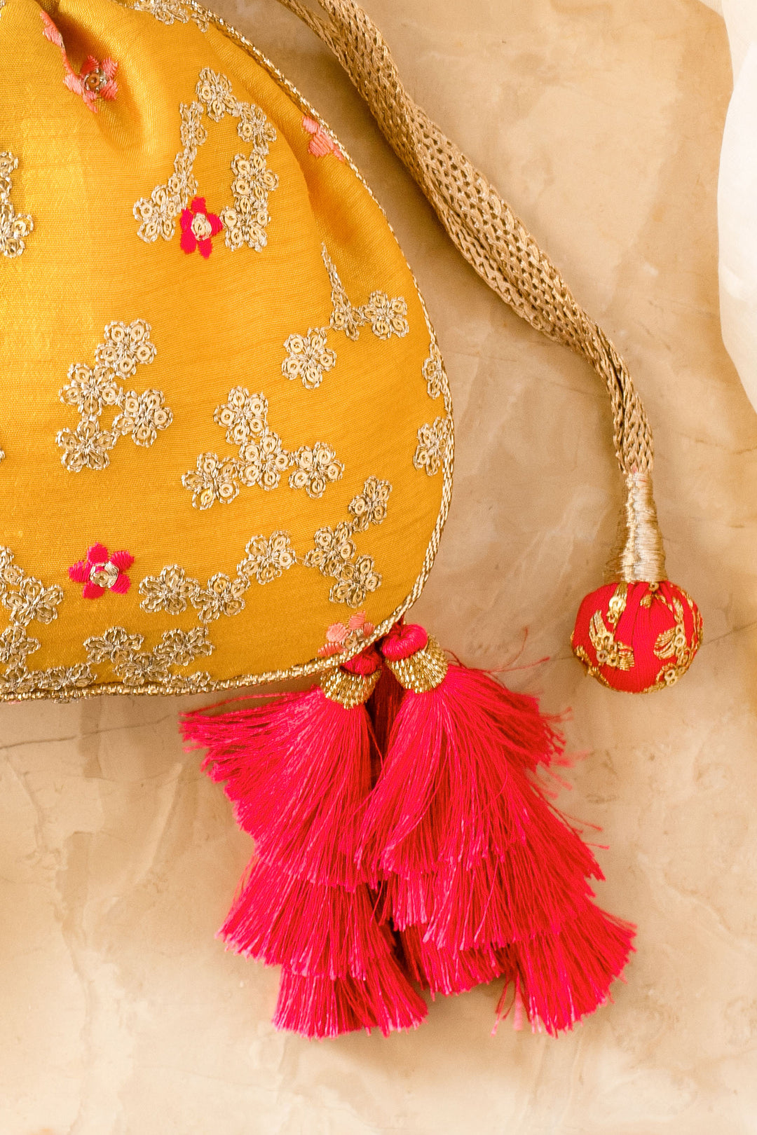 Azalea Yellow And Hot Pink Tassle Potli Bag