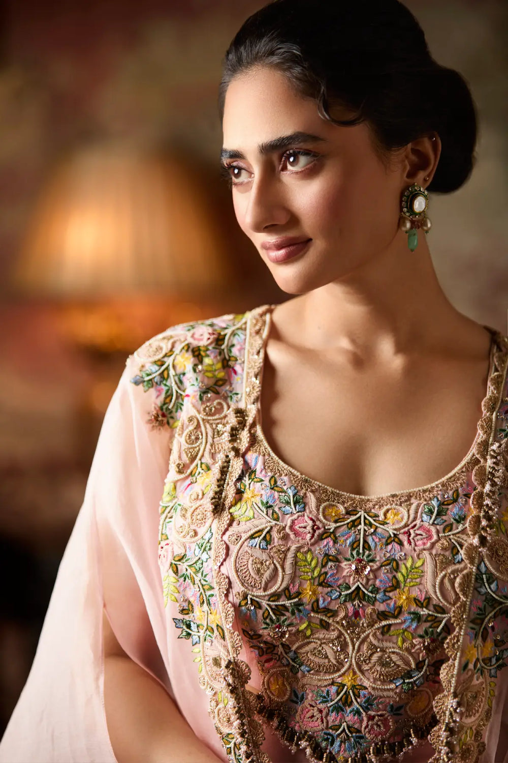 Woman wearing a traditional embroidered Skirt Set with a blurred background