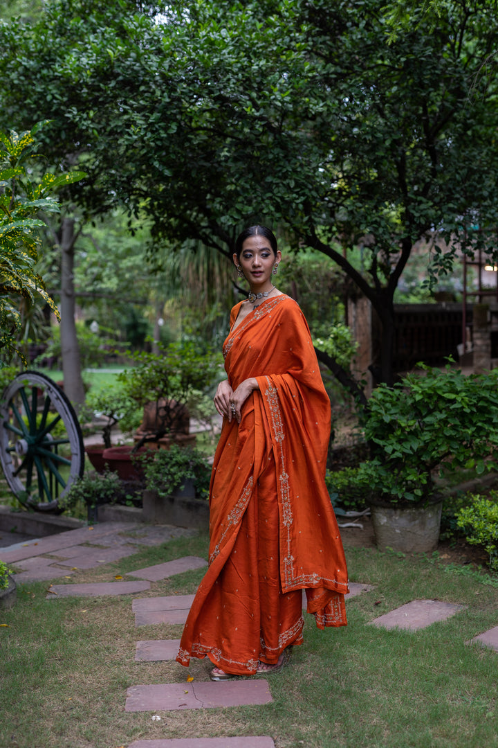 rust orange hand embroidered silk saree
