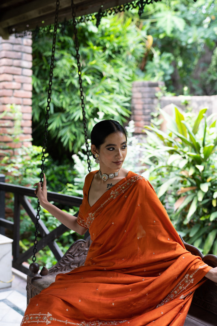 rust orange hand embroidered silk saree
