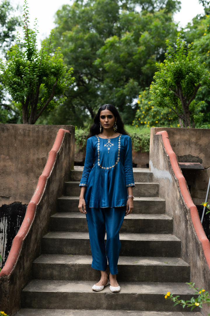 cobalt blue peplum with straight pant