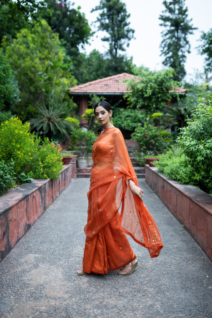 rust orange half and half hand embroidered saree with blouse