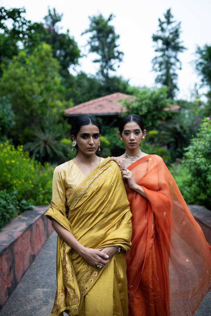 rust orange half and half hand embroidered saree with blouse