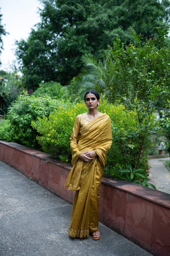 molten gold yellow hand embroidered saree with blouse
