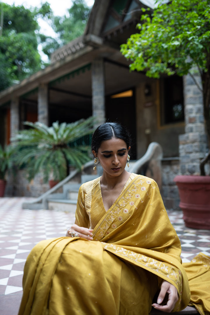 molten gold yellow hand embroidered saree with blouse