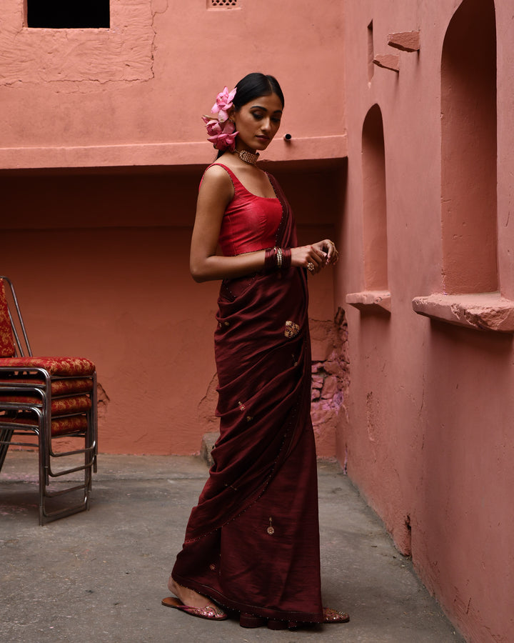 mahogany hand embroidered saree with vermillion blouse