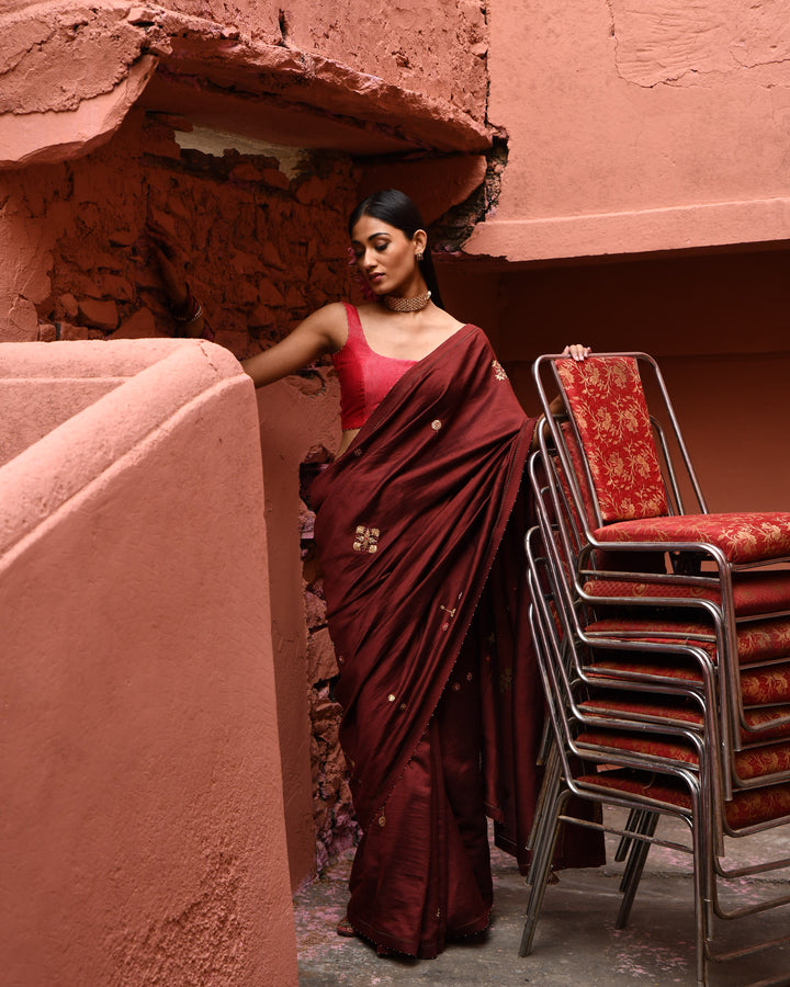 mahogany hand embroidered saree with vermillion blouse