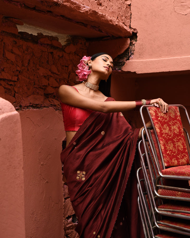 mahogany hand embroidered saree with vermillion blouse