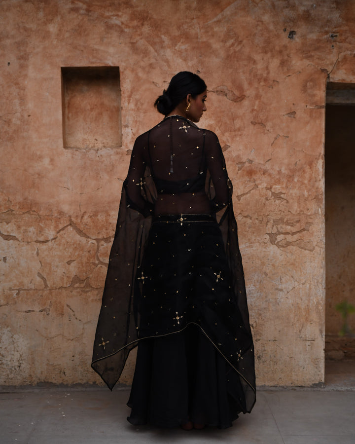 black cape and skirt set