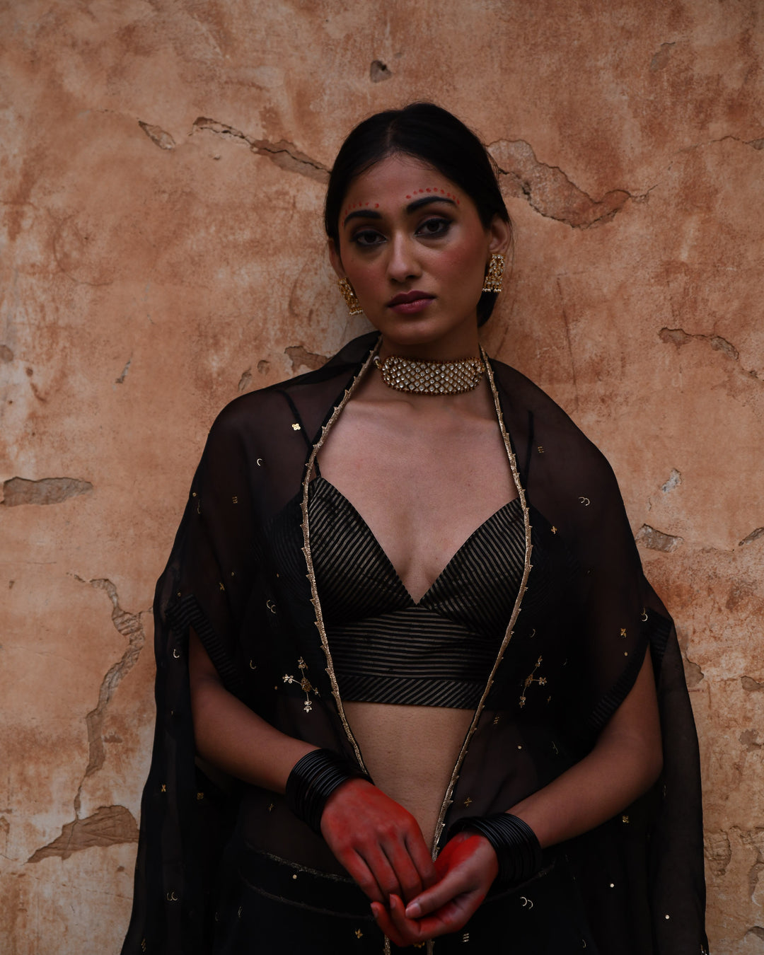 black cape and skirt set
