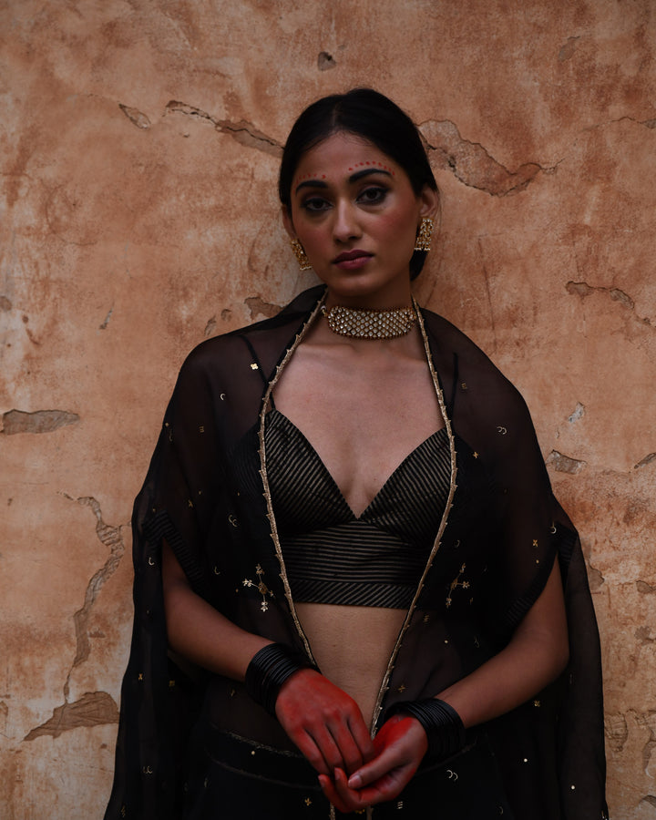black cape and skirt set