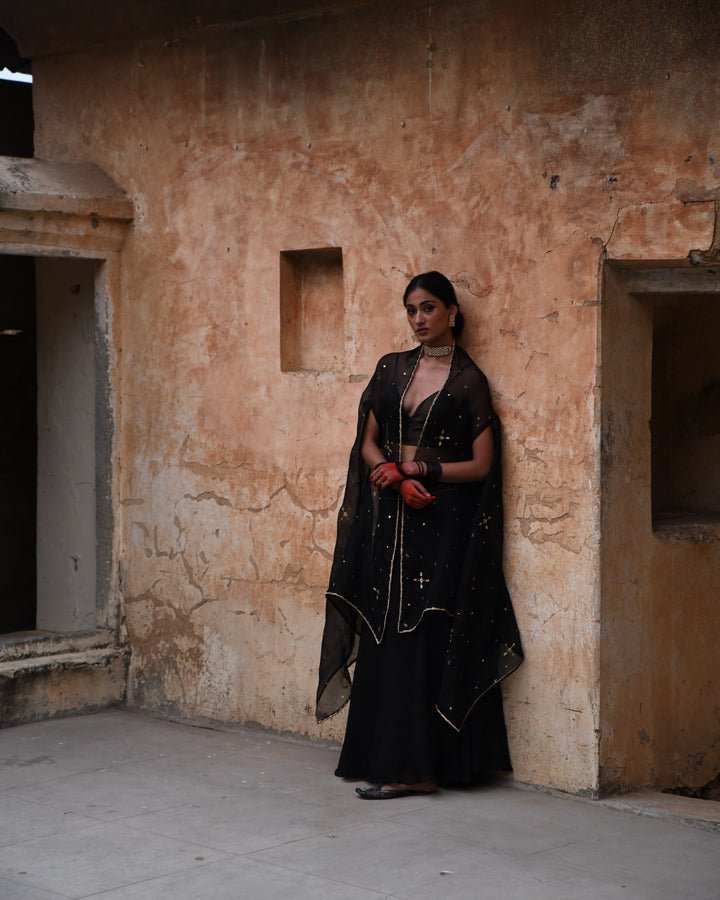 black cape and skirt set
