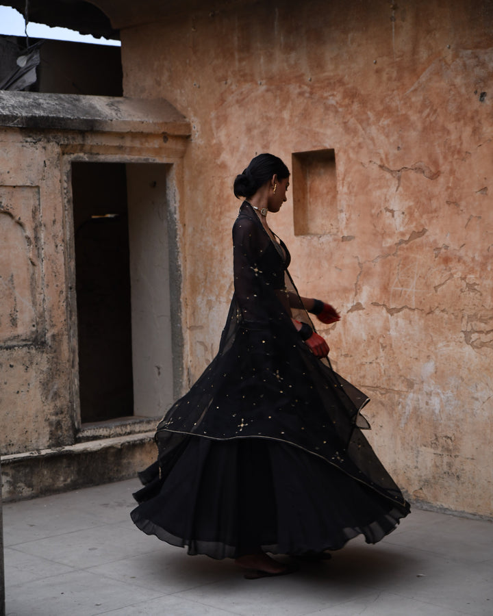 black cape and skirt set