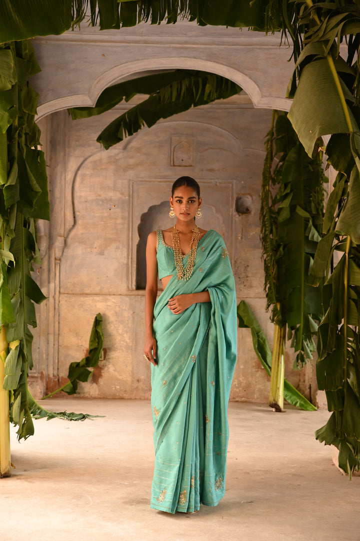 powder blue hand embroidered saree with blouse