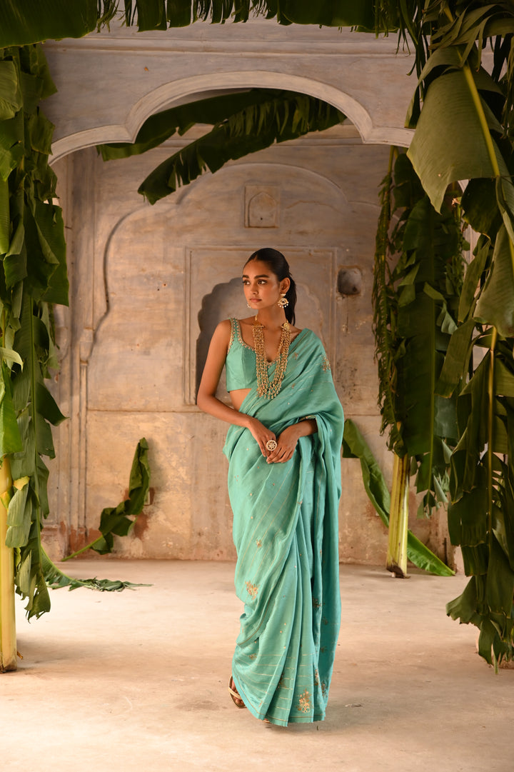 powder blue hand embroidered saree with blouse