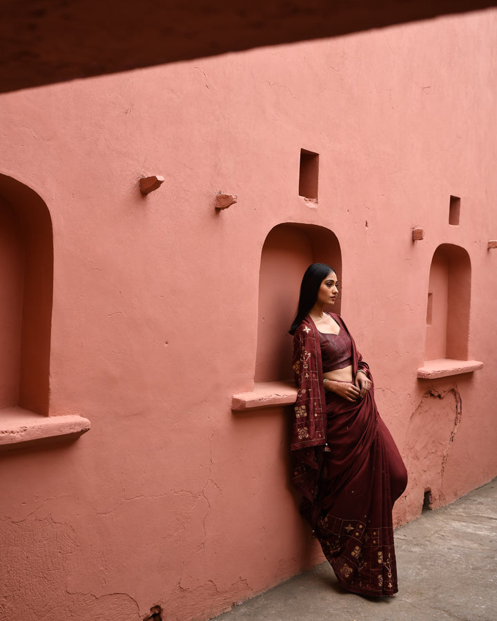 mahogany hand embroidered saree with brown blouse