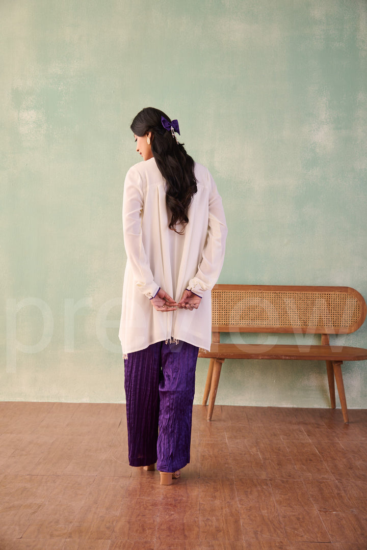 yoke with box pleatted ghera with churidar sleeves comes along with pleated pant