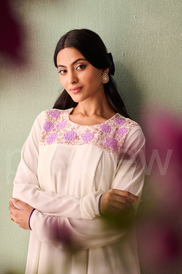 yoke with box pleatted ghera with churidar sleeves comes along with pleated pant