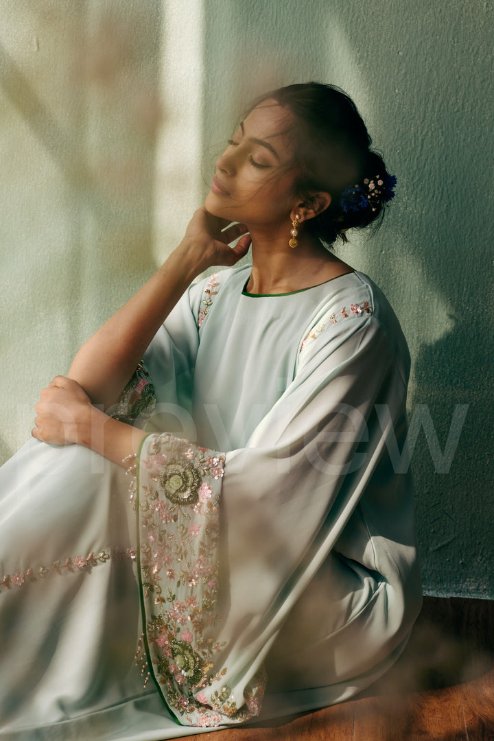 long a-line shirt with big bell sleeve comes along with pleated fabric