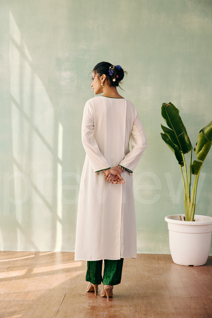 long shirt with front cross pannel comes along with pleated pant