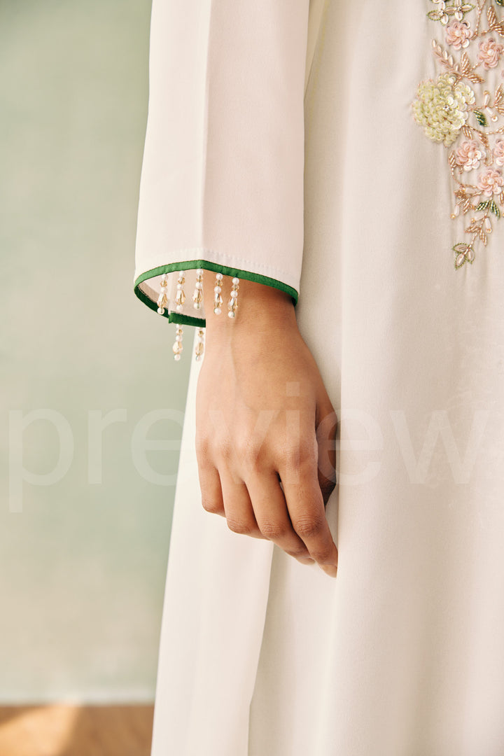 long shirt with front cross pannel comes along with pleated pant