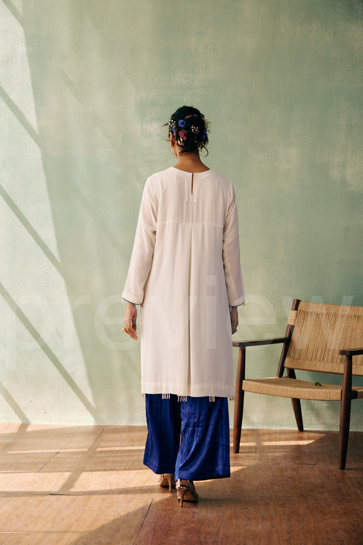 high low straight kurta with embroidery on front side ghera comes along with pleated pant