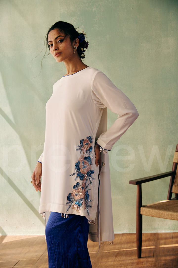high low straight kurta with embroidery on front side ghera comes along with pleated pant