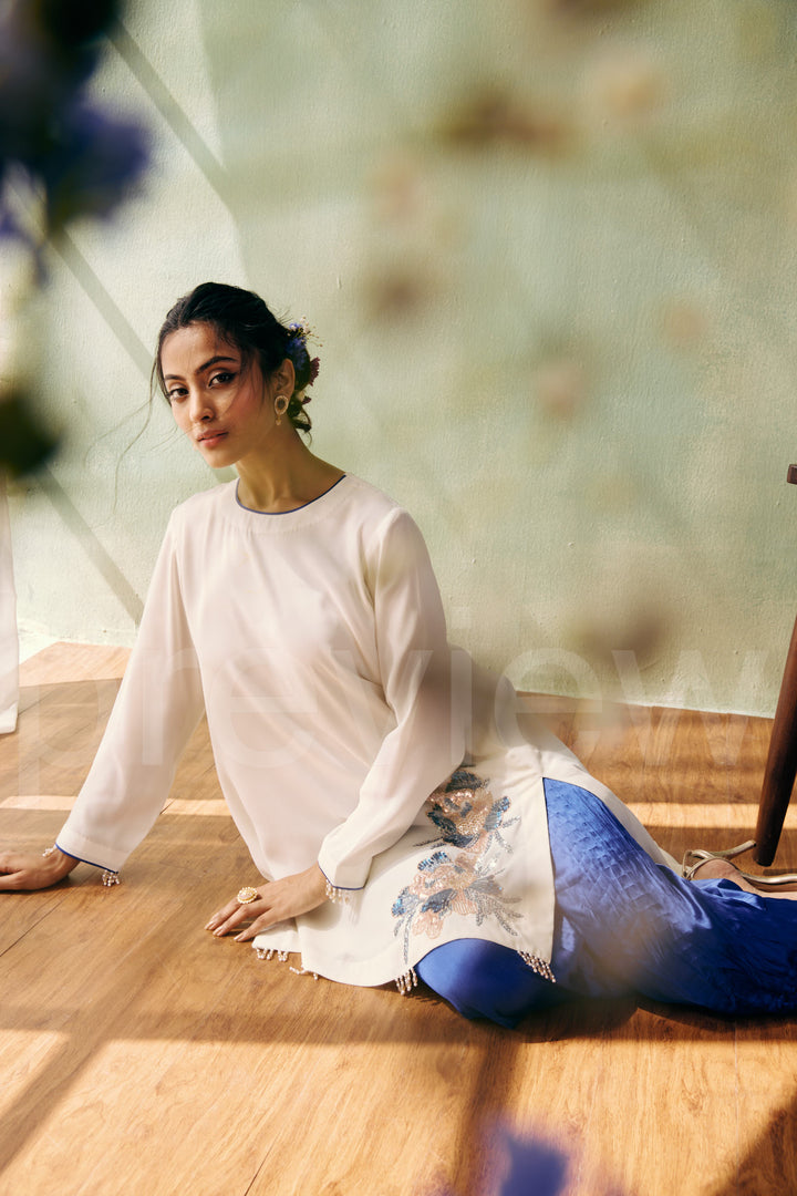 high low straight kurta with embroidery on front side ghera comes along with pleated pant
