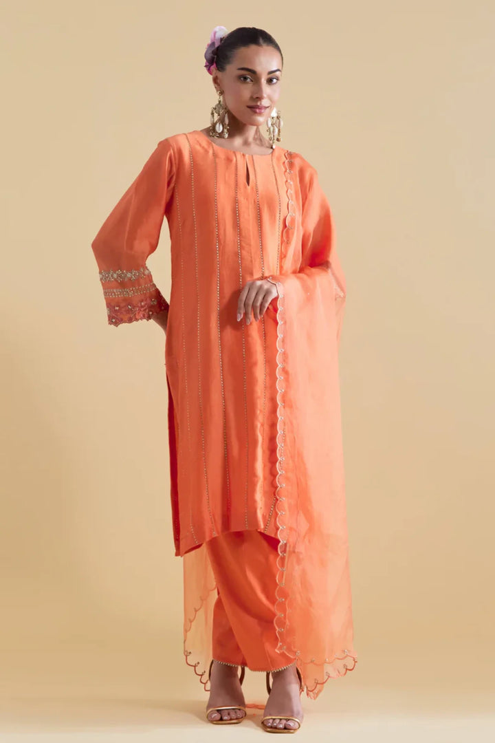 Orange Short Kurta with a Salwaar