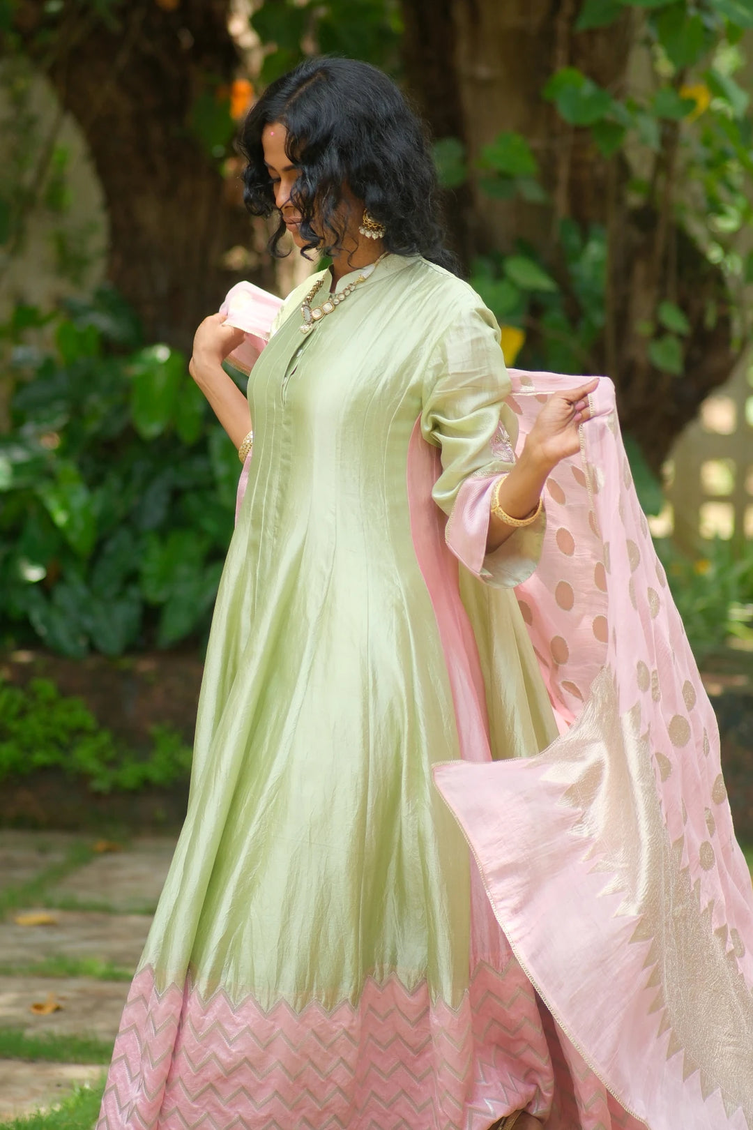 Silk kalidar kurta W benerasi woven border & handwork on sleeve W polka dupatta & contrast pant