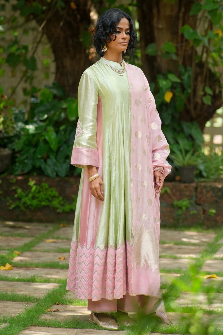 Silk kalidar kurta W benerasi woven border & handwork on sleeve W polka dupatta & contrast pant
