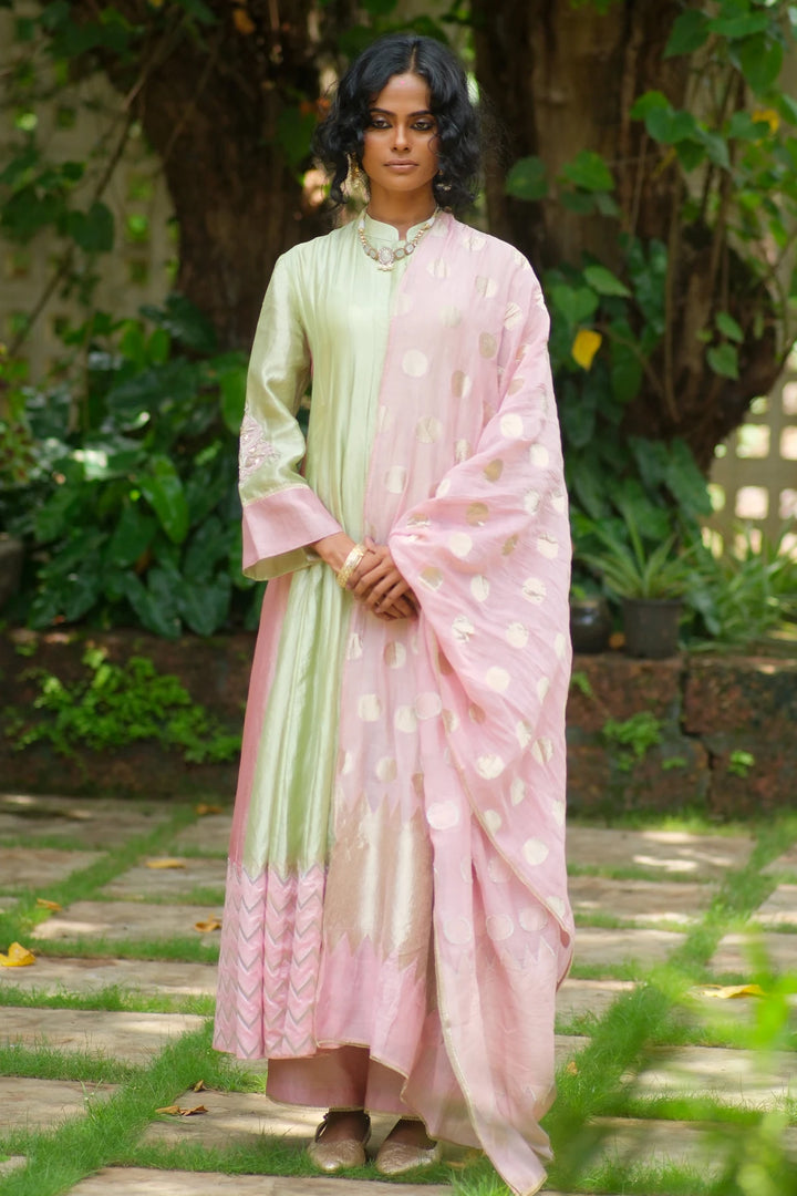 Silk kalidar kurta W benerasi woven border & handwork on sleeve W polka dupatta & contrast pant